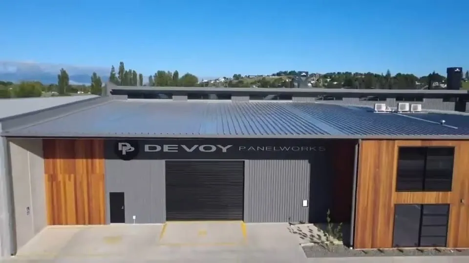 Close-up of Devoy Panelworks signage on the Te Awamutu workshop.